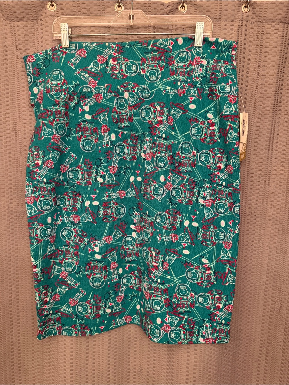LuLaRoe Teal Skirt with Pink & White Graphic Print